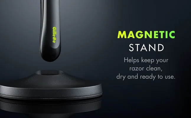 Gillette razor hovering above its magnetic stand, designed to keep the razor clean, dry, and ready for use.