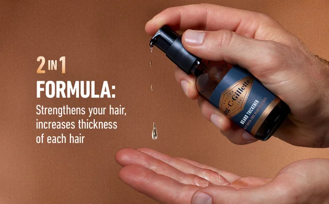 King C. Gillette Beard Thickener with a 2in1 formula is dispensed onto hand.