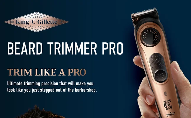 Male hand holding Beard Trimmer PRO that gives ultimate trimming precision.
