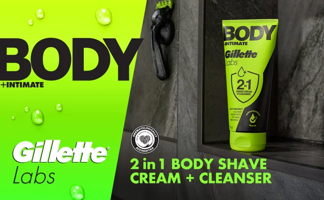 Image of the GilletteLabs Body 2in1 Shave Cream + Cleanser sitting on a shelf in the shower.