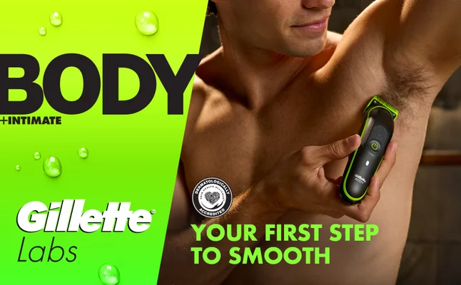 Man trimming his underarm with GilletteLabs i3 Body Trimmer. Text: Your first step to smooth.