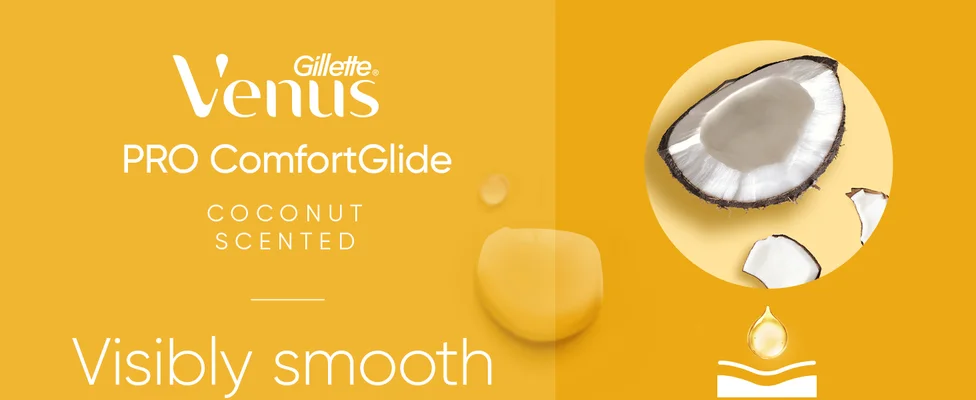 Venus Gillette Pro ComfortGlide that is coconut scented next to slices of coconut.