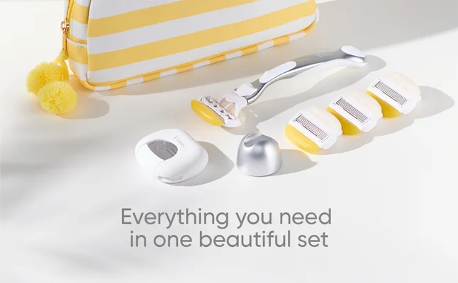 The Venus Pro ComfortGlide Coconut Set: Pro ComfortGlide Coconut razor, 4 blades, shower hanger, blade cover and cosmetic bag