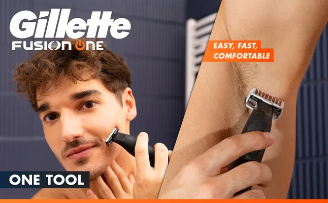 Man is shaving his face and armpit with the Gillette Fusion One Electric Razor.