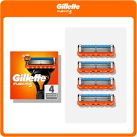 Gillette Fusion 5 razor blade refills, pack of 4, showing the lubrication before and after the blades.
