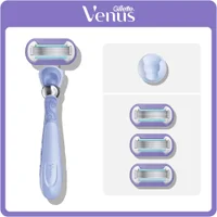 Gillette Venus razor handle and four blade refills, plus a shower holder.