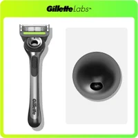 GilletteLabs razor, grey and black, with its magnetic stand.