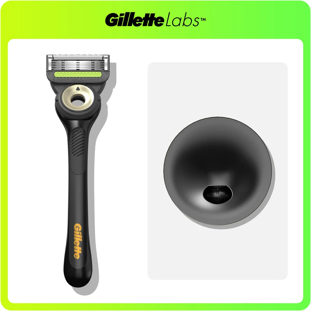 GilletteLabs black razor with its circular magnetic charging dock.