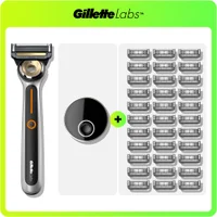 GilletteLabs Heated Razor, magnetic charging dock, and numerous blade refills.