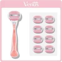 Gillette Venus razor handle with 8 replacement blade cartridges.