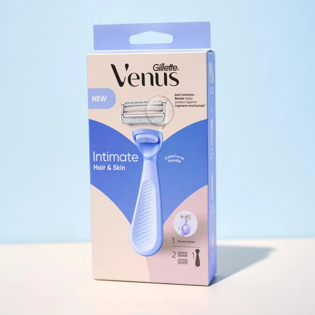 The Gillette Venus Intimate Hair & Skin razor in its packaging, highlighting its anti-irritation blades and features designed to protect against ingrowns and bumps, set against a blue gradient background.