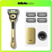 GilletteLabs gold razor, 4 blade refills, travel case and magnetic stand.