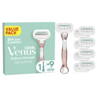 Venus Pro Smooth Sensitive razor with packaging, razor stand, and nine additional blade refills.