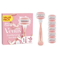 Venus Comfortglide Spa Breeze razor with packaging showing the inclusion of six blade refills.