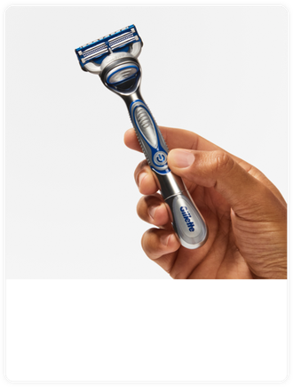 Gillette SkinGuard Sensitive Razor in hand | Gillette UK